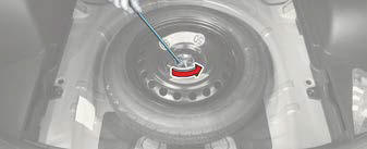 Removing and storing the spare tire