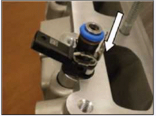 9. Twist slightly while pressing the injector into position in the head.
