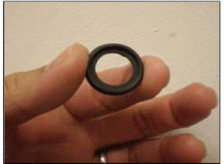13. The flat washer side of the seal goes towards the head.