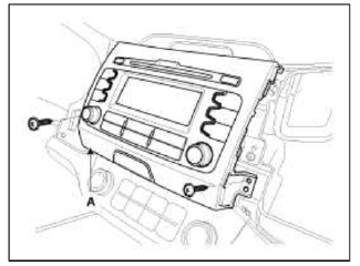 5. Disconnect the center facia connectors (A).