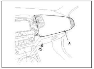 4. Using the screwdriver, remove the center facia panel (A).