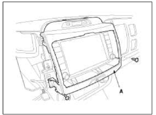 5. Disconnect the center facia connectors (A).