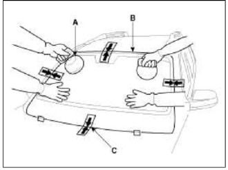 9. Scrape or wipe the excess adhesive off with a putty knife or towel. To